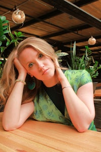 a woman sitting at a table